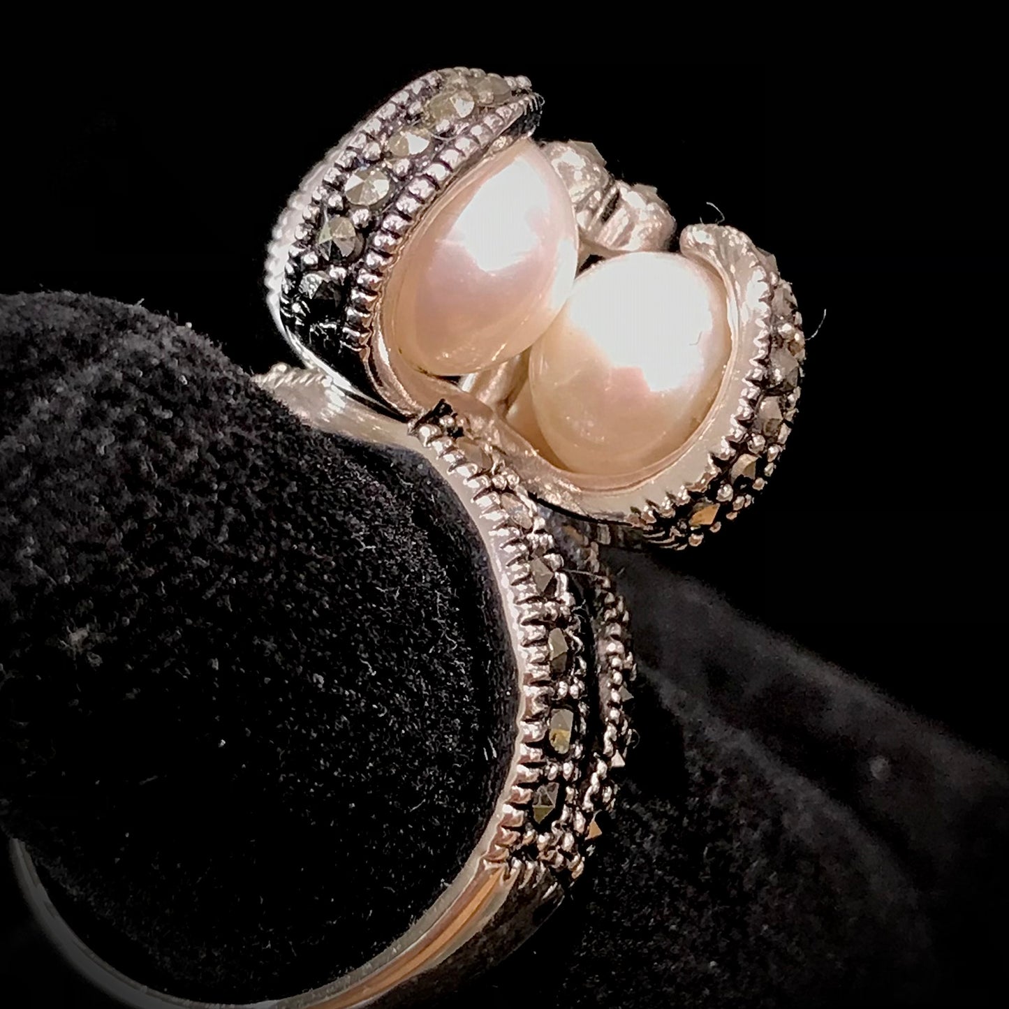 Pearl and marcasite ring set in sterling silver.