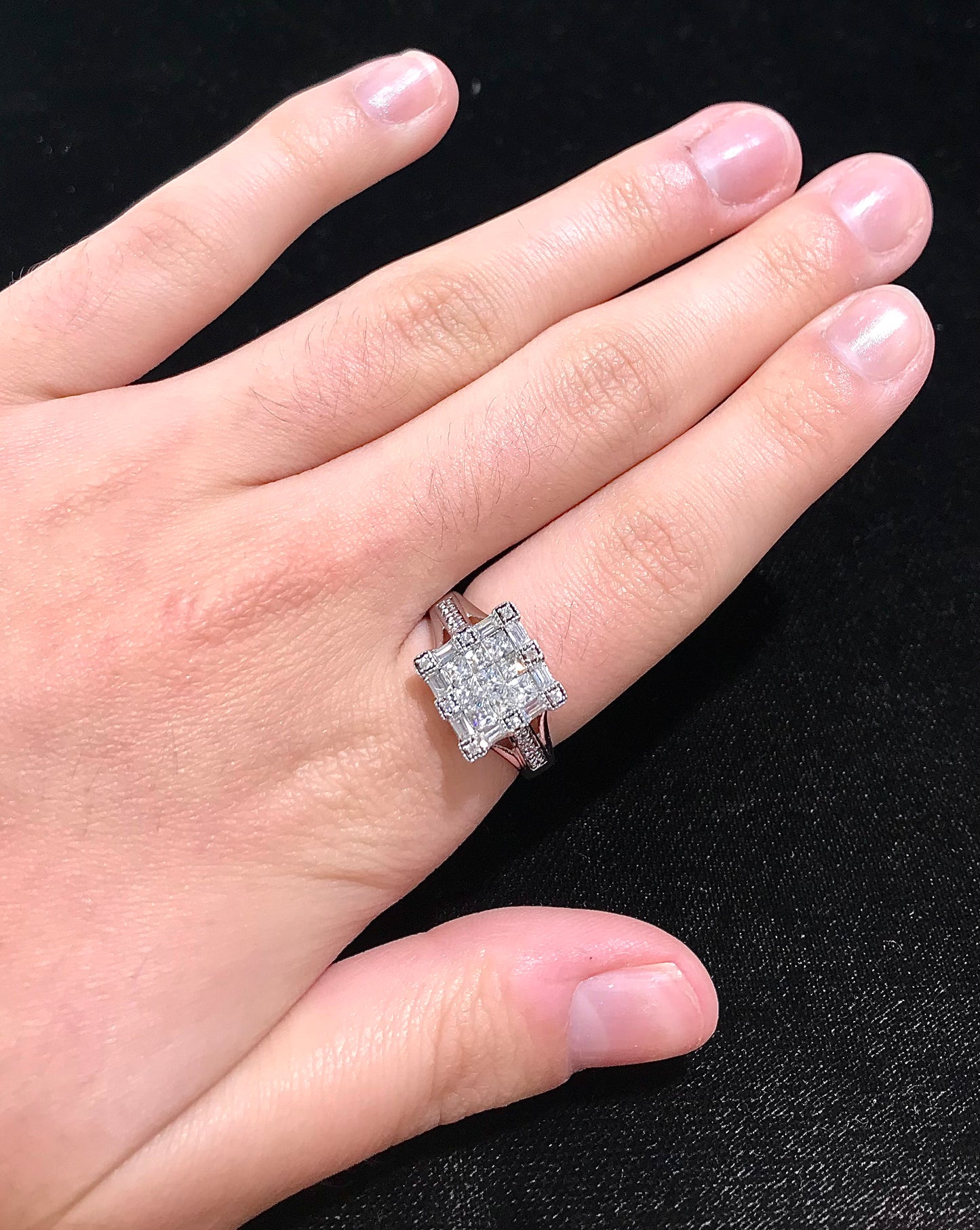 Square cubic zirconia ring set in sterling silver.