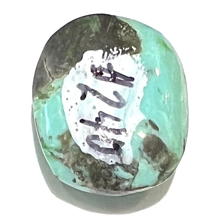 Loose cabochon cut Sleeping Beauty turquoise stone.