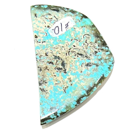 Freeform cabochon cut Valley Blue turquoise from Lander County, Nevada.