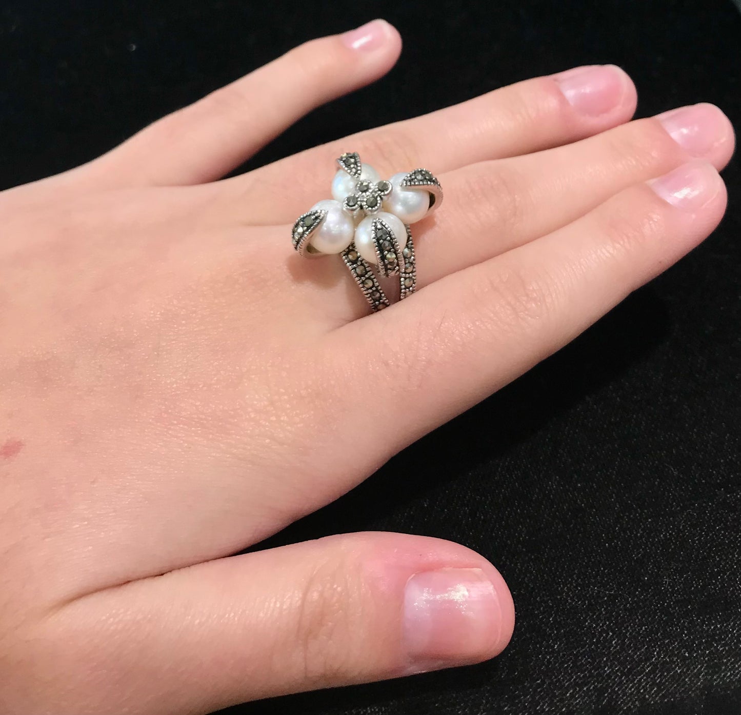 Pearl and marcasite ring set in sterling silver.