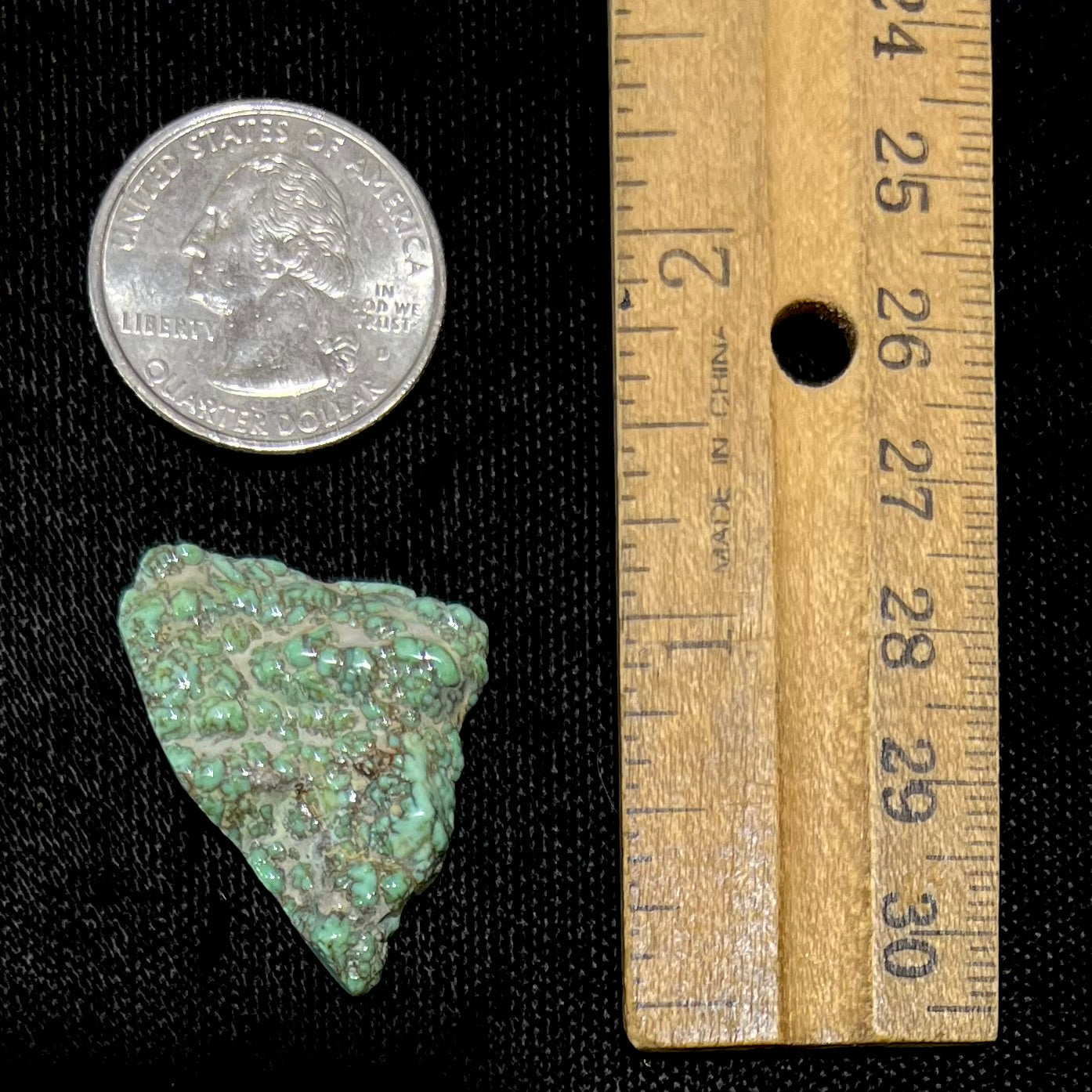 Loose semi-polished rough variscite stone slice.