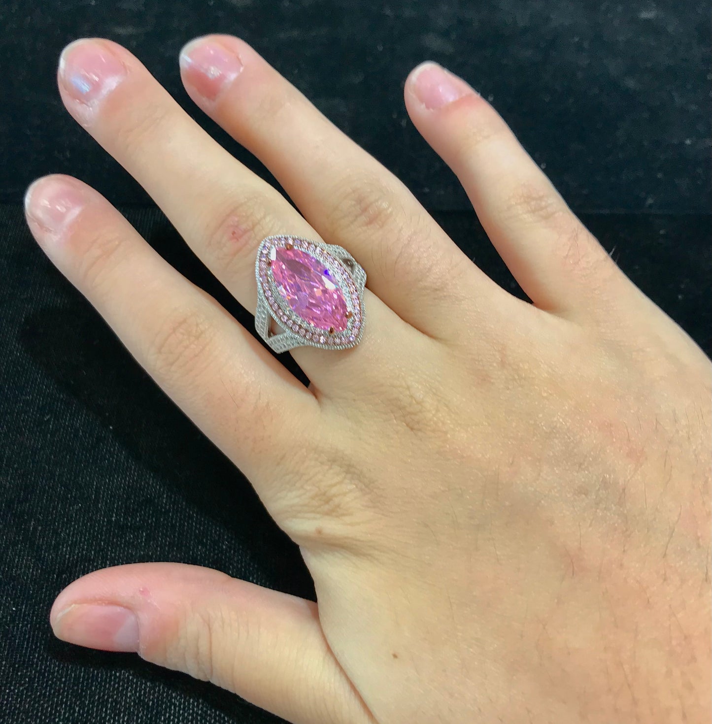 Pink marquee cubic zirconia ring set in sterling silver.