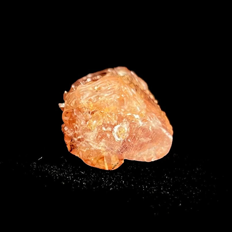 A dragon carved by Ronald Stevens from imperial topaz crystal.