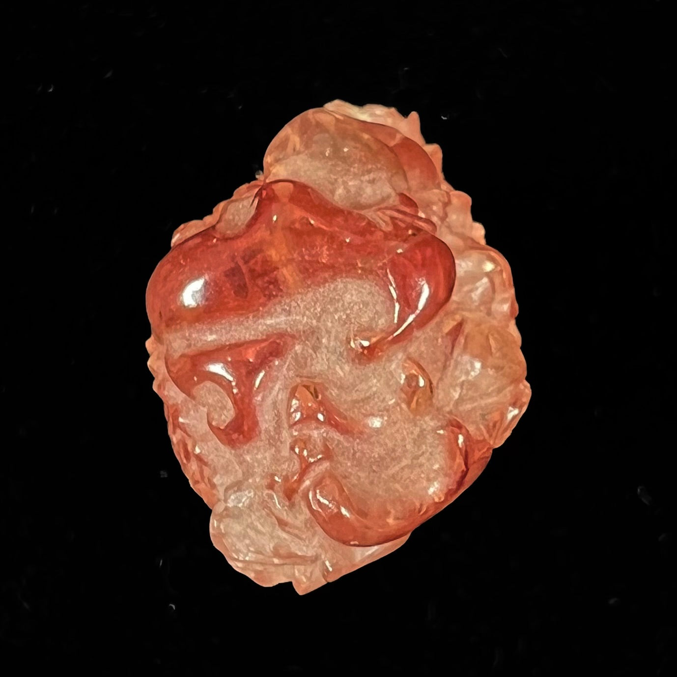 A dragon carved by Ronald Stevens from imperial topaz crystal.