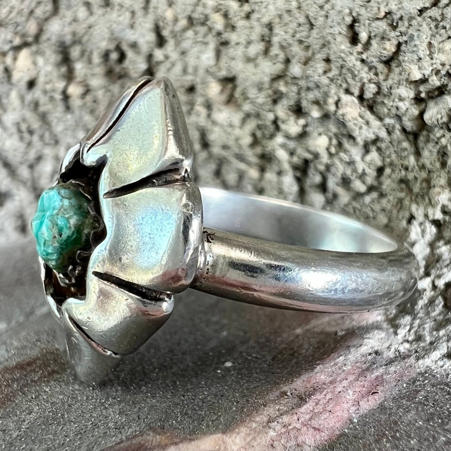 A handmade, sterling silver Native American turquoise nugget ring.