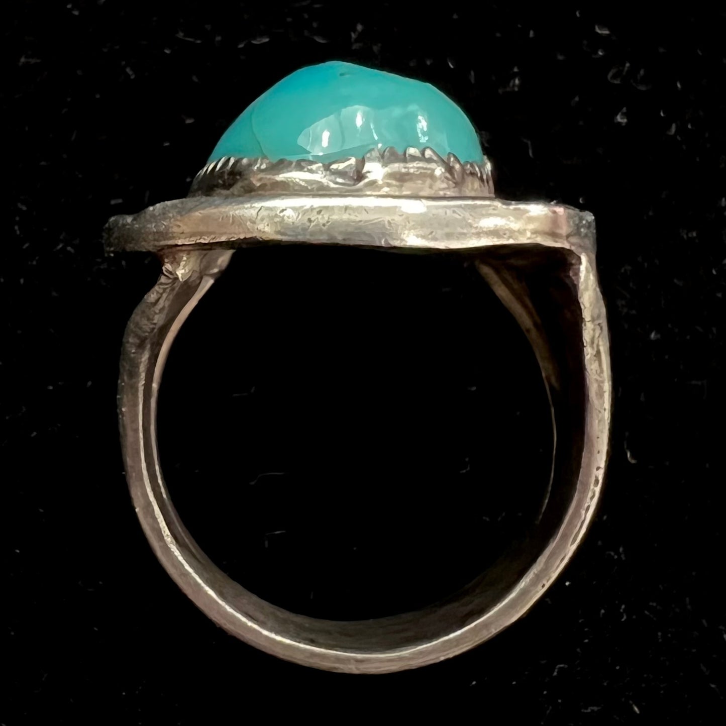 A men's sterling silver freeform cabochon cut turquoise ring.
