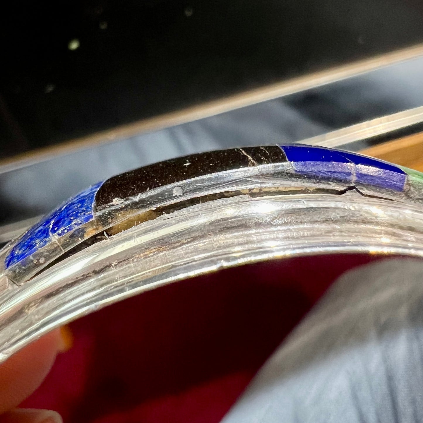 A men's vintage sterling silver Hopi Indian cuff bracelet set with tiger's eye, lapis lazuli, turquoise, jet, and rhodonite.