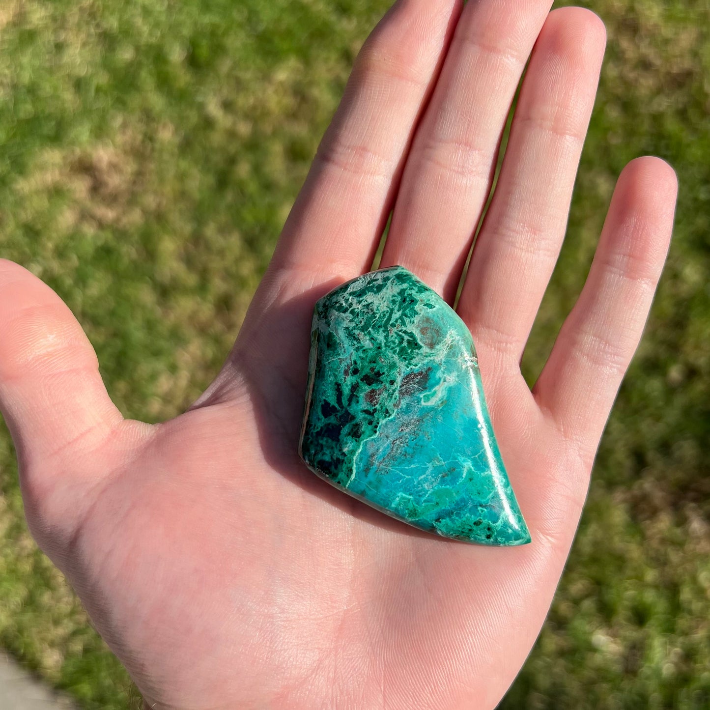 A polished, freeform shaped Eilat stone from King Solomon's Mine, Israel.