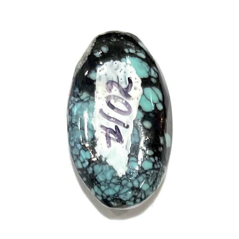 A black spiderweb turquoise stone from Nevada.