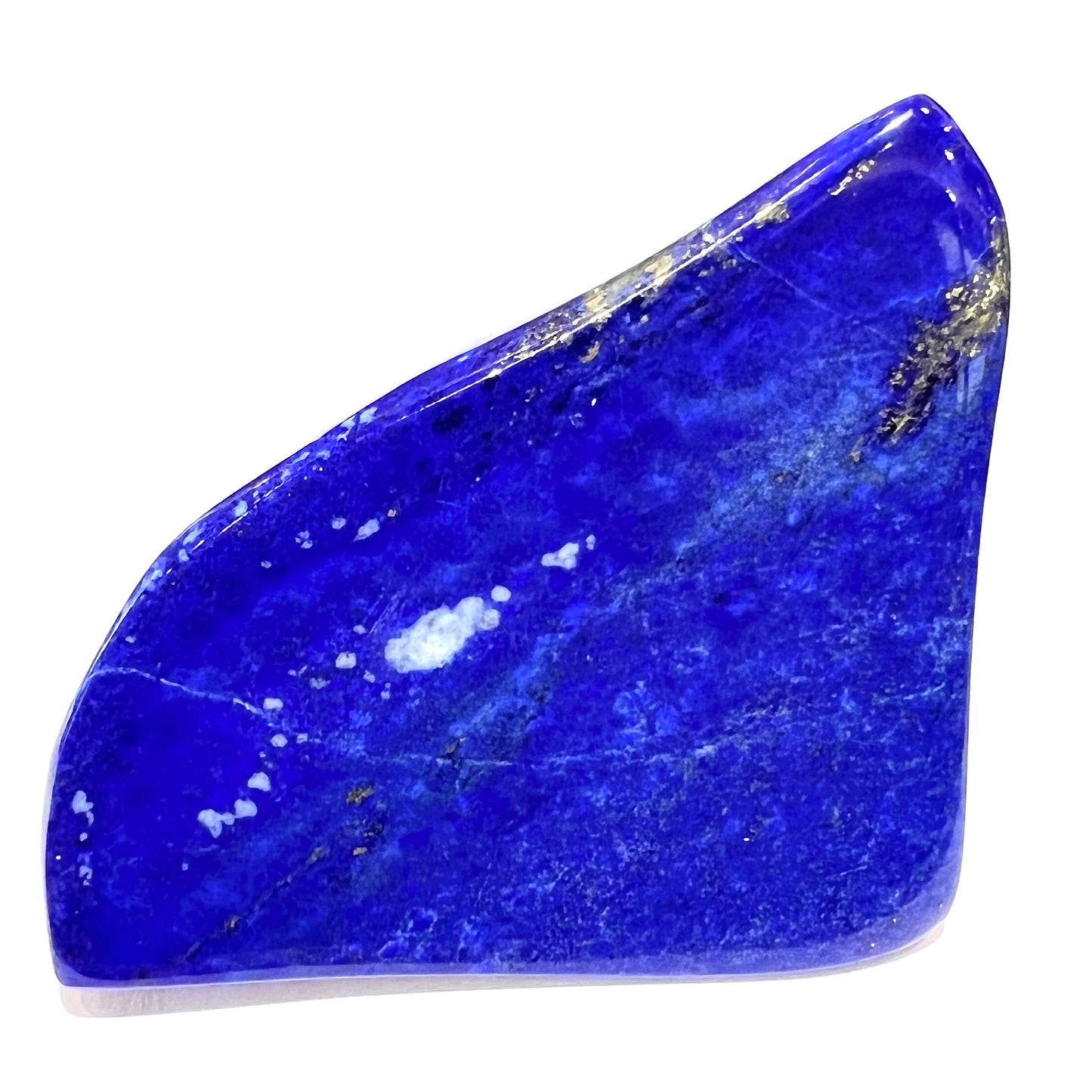 A loose polished sculpture made from royal blue lapis lazuli with golden pyrite inclusions.