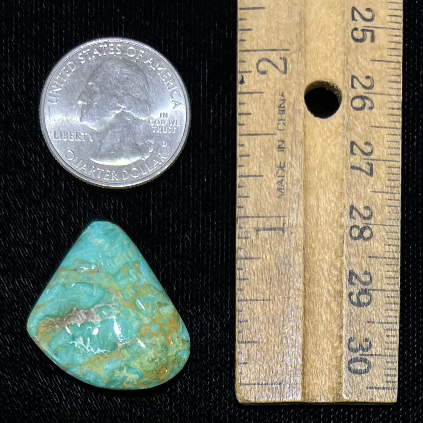 A loose green turquoise stone from Royston District, Nevada.