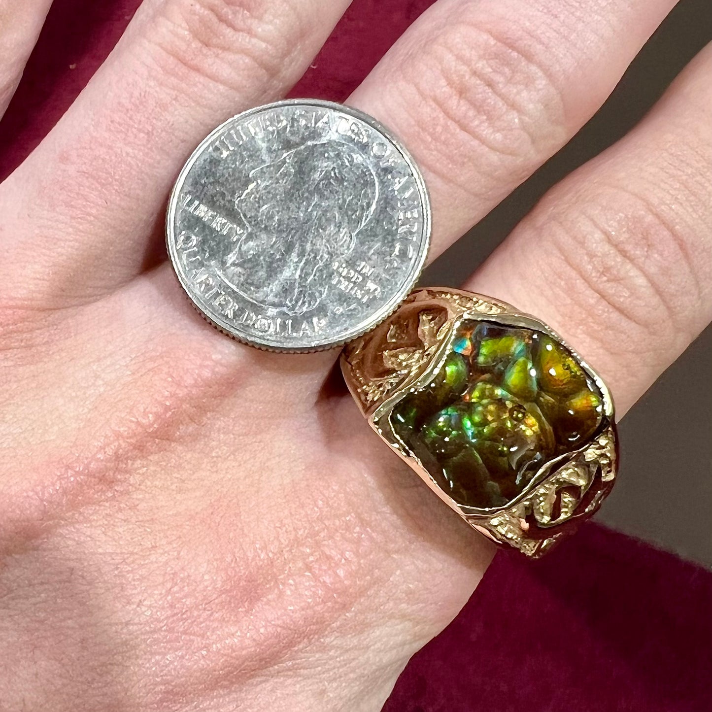 Custom, heavy yellow gold men's ring set with fire agate from Deer Creek, Arizona.