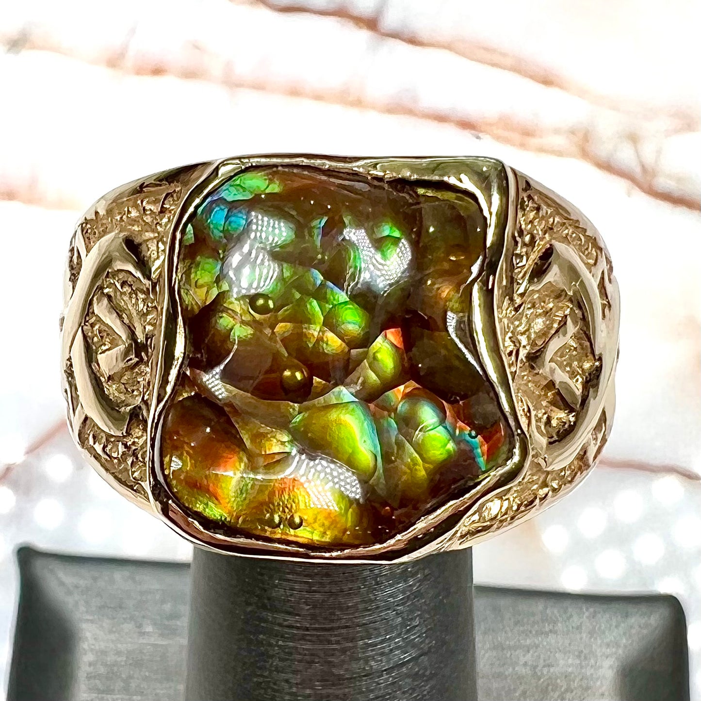 Custom, heavy yellow gold men's ring set with fire agate from Deer Creek, Arizona.
