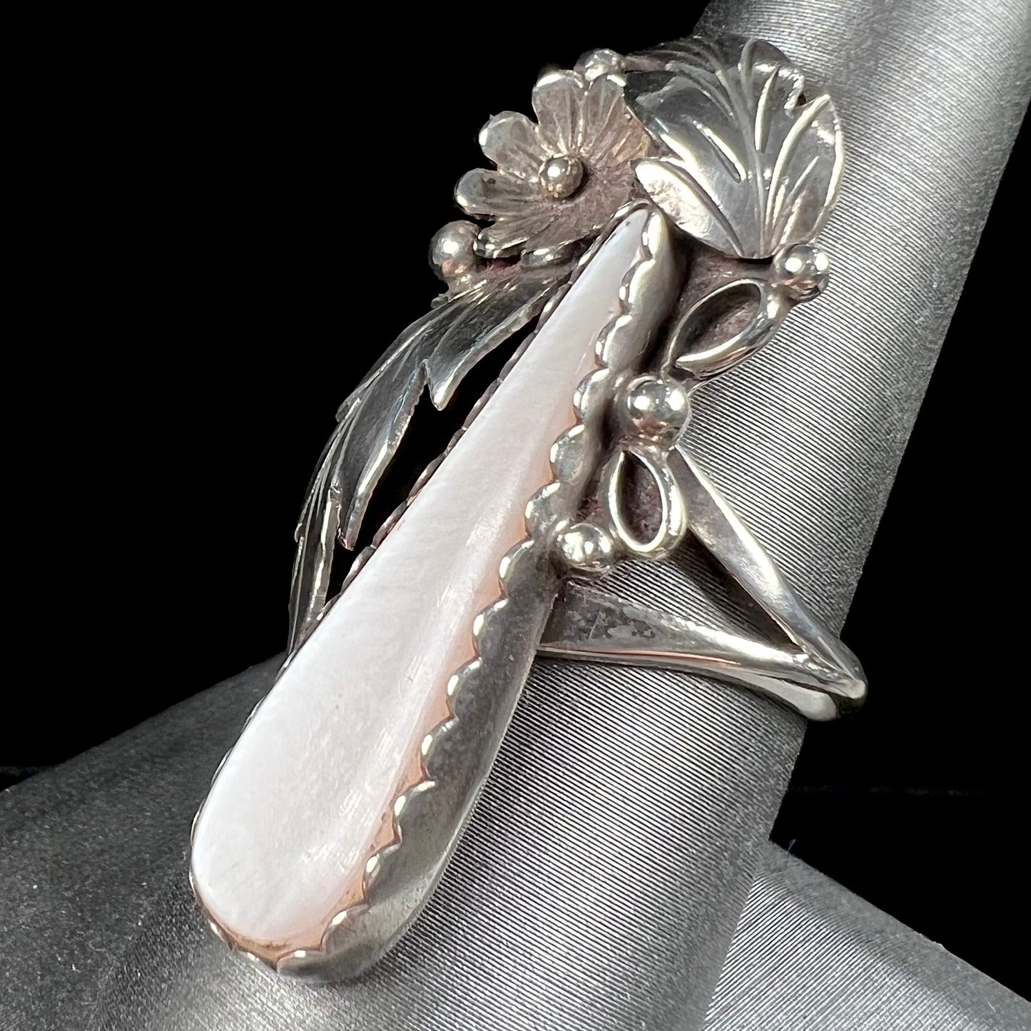 A sterling silver mother of pearl drop ring handmade in Navajo style, signed "MORNINGSTAR."