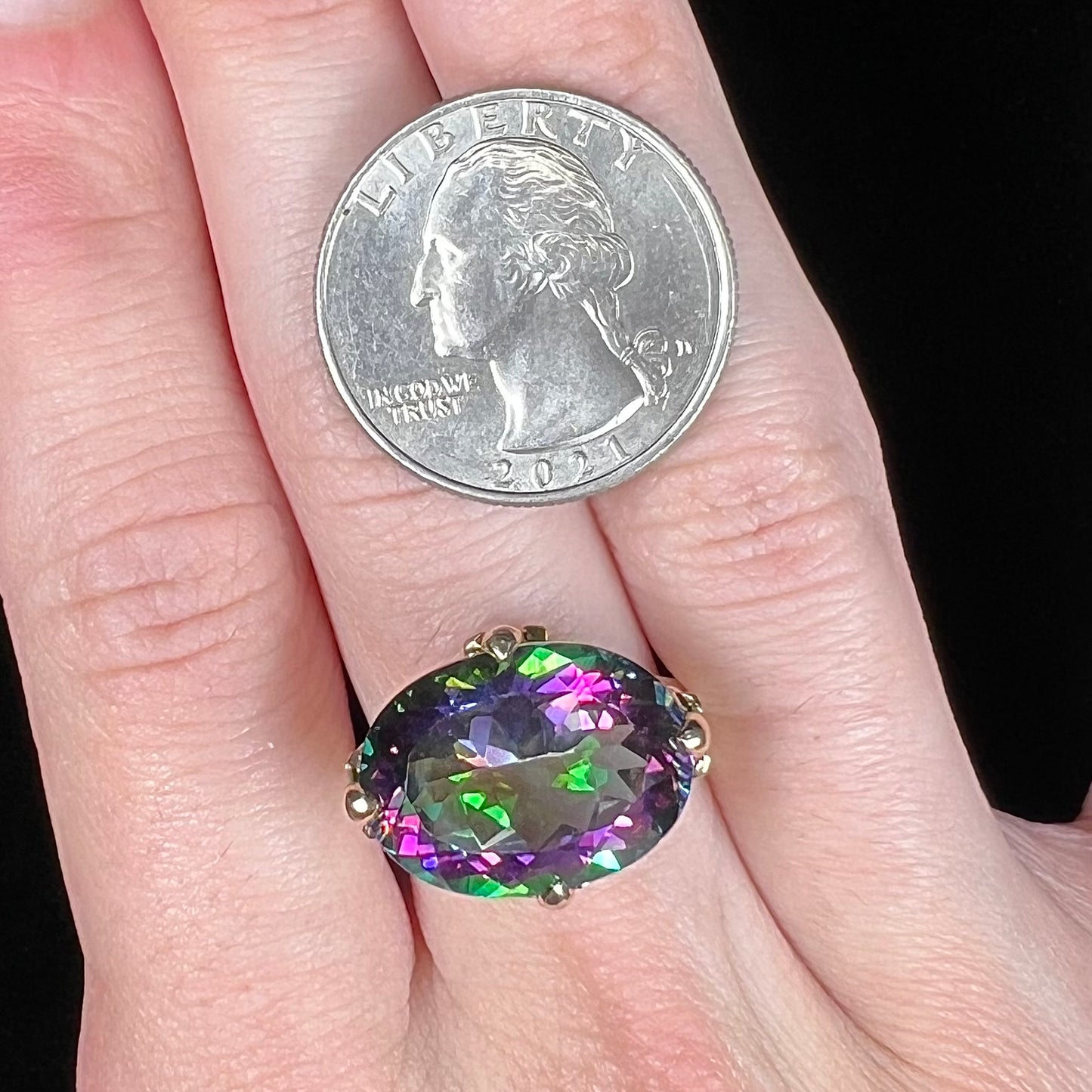 A ladies' large mystic topaz, chrome diopside, and diamond statement ring cast in 14k yellow gold.
