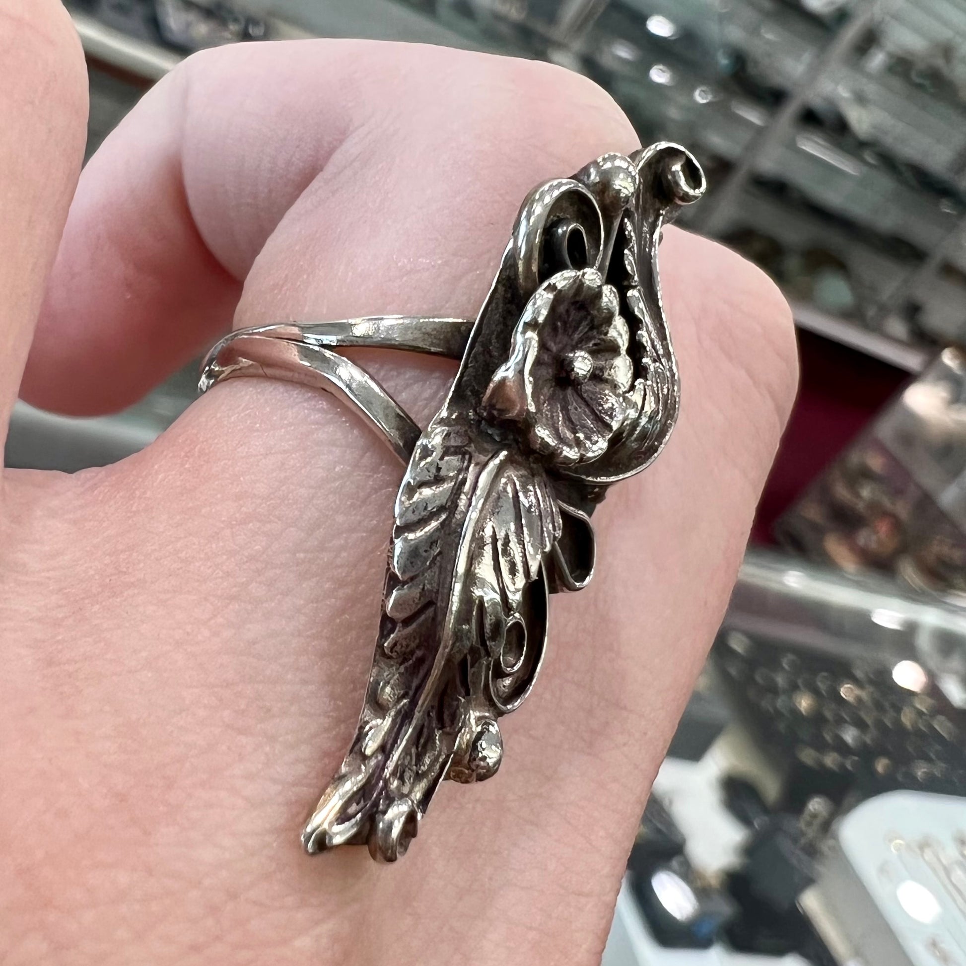 A sterling silver Navajo flower ring.