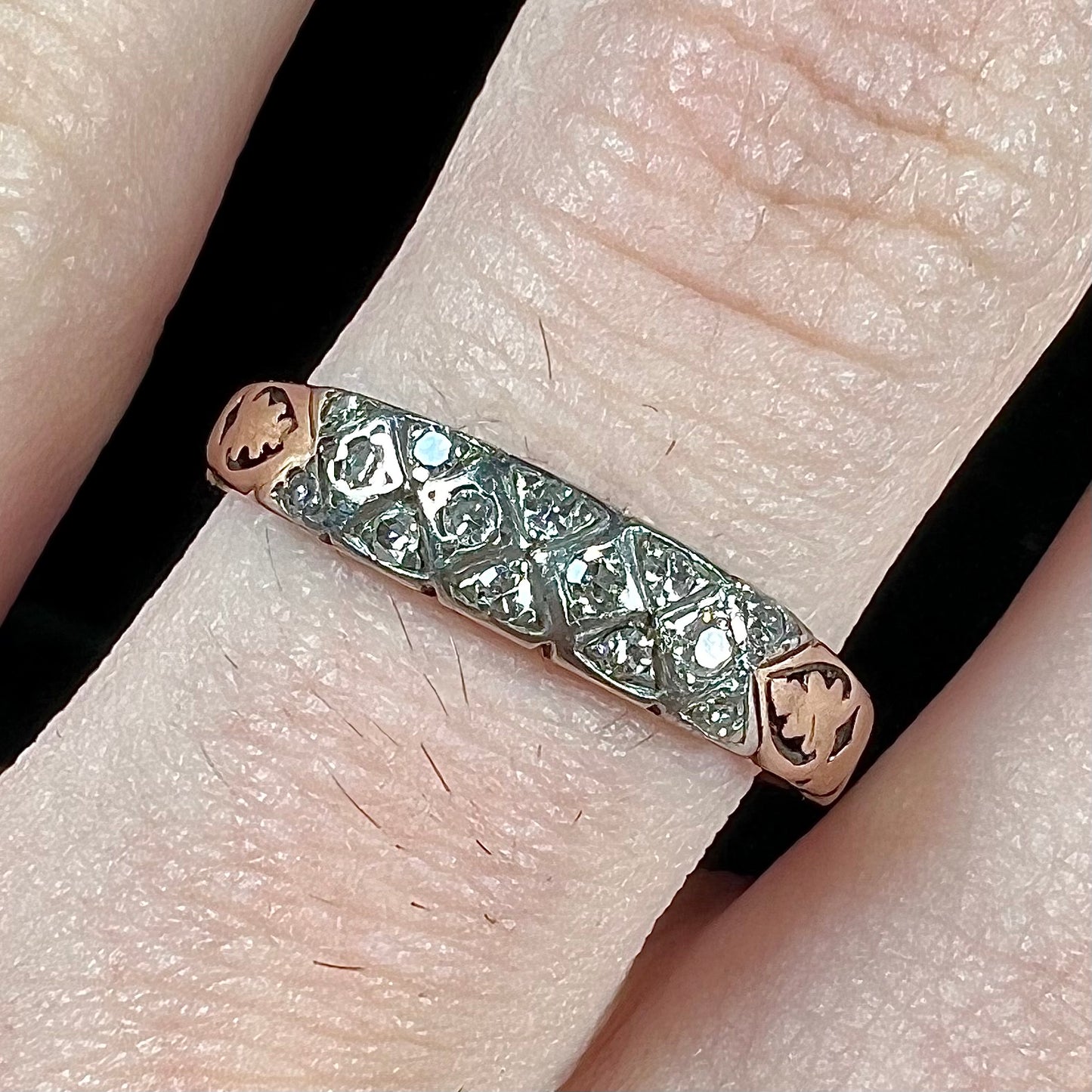 An antique yellow gold ladies' band set with old European cut diamonds.
