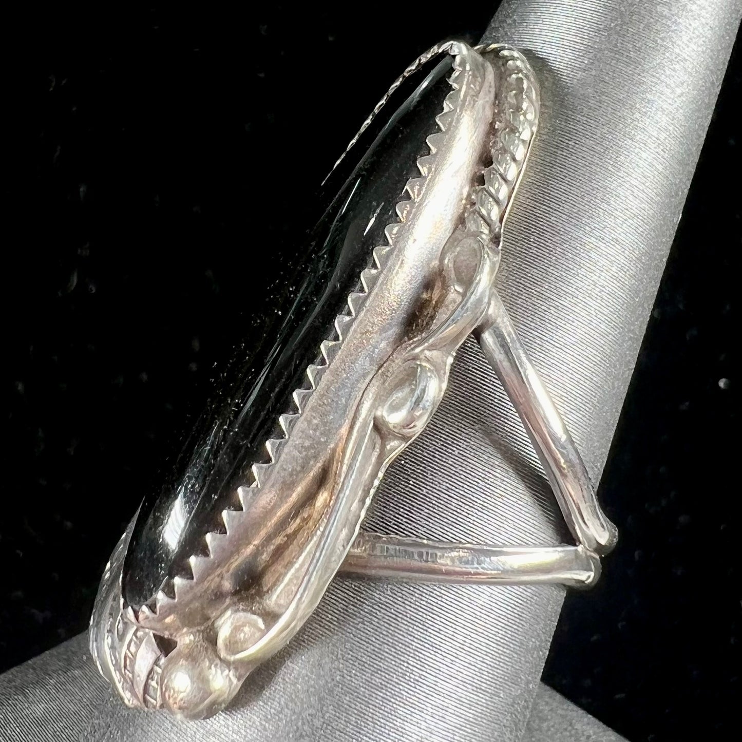 An elongated silver onyx ring handmade by Navajo artist, Tom Taylor.