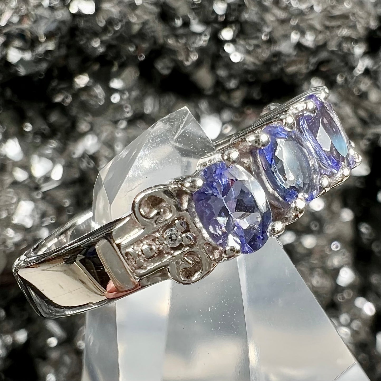 A sterling silver five stone oval cut tanzanite ring.