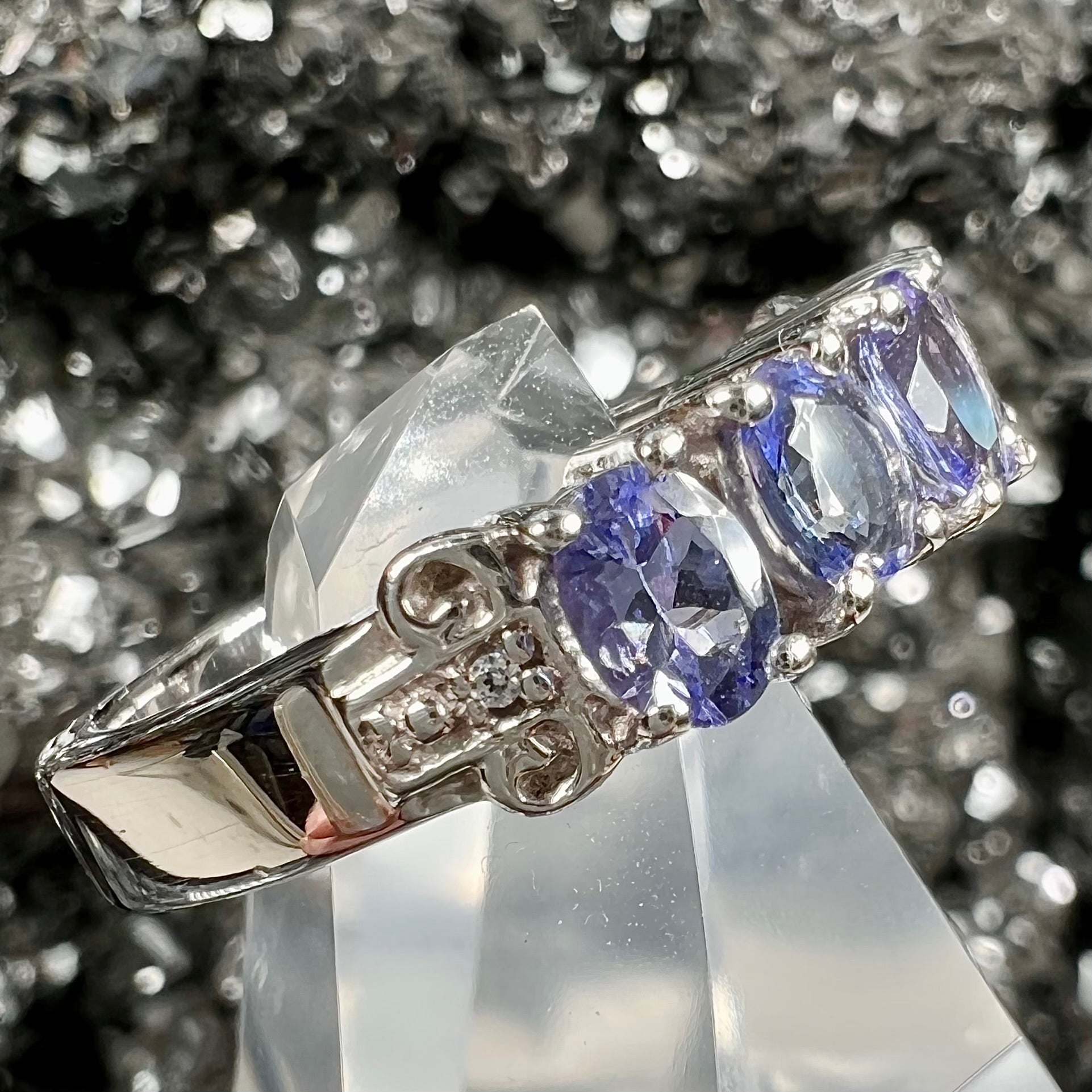 A sterling silver five stone oval cut tanzanite ring.