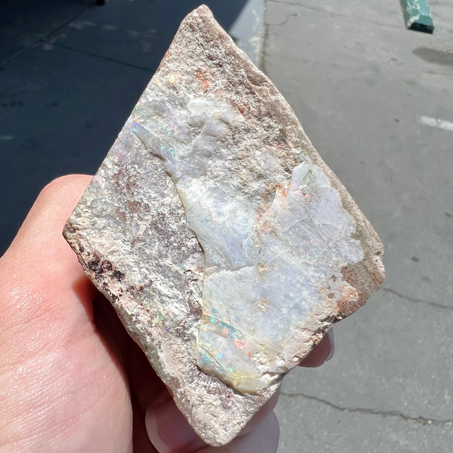 A lightly polished Painted Lady opal specimen from Andamooka, South Australia.