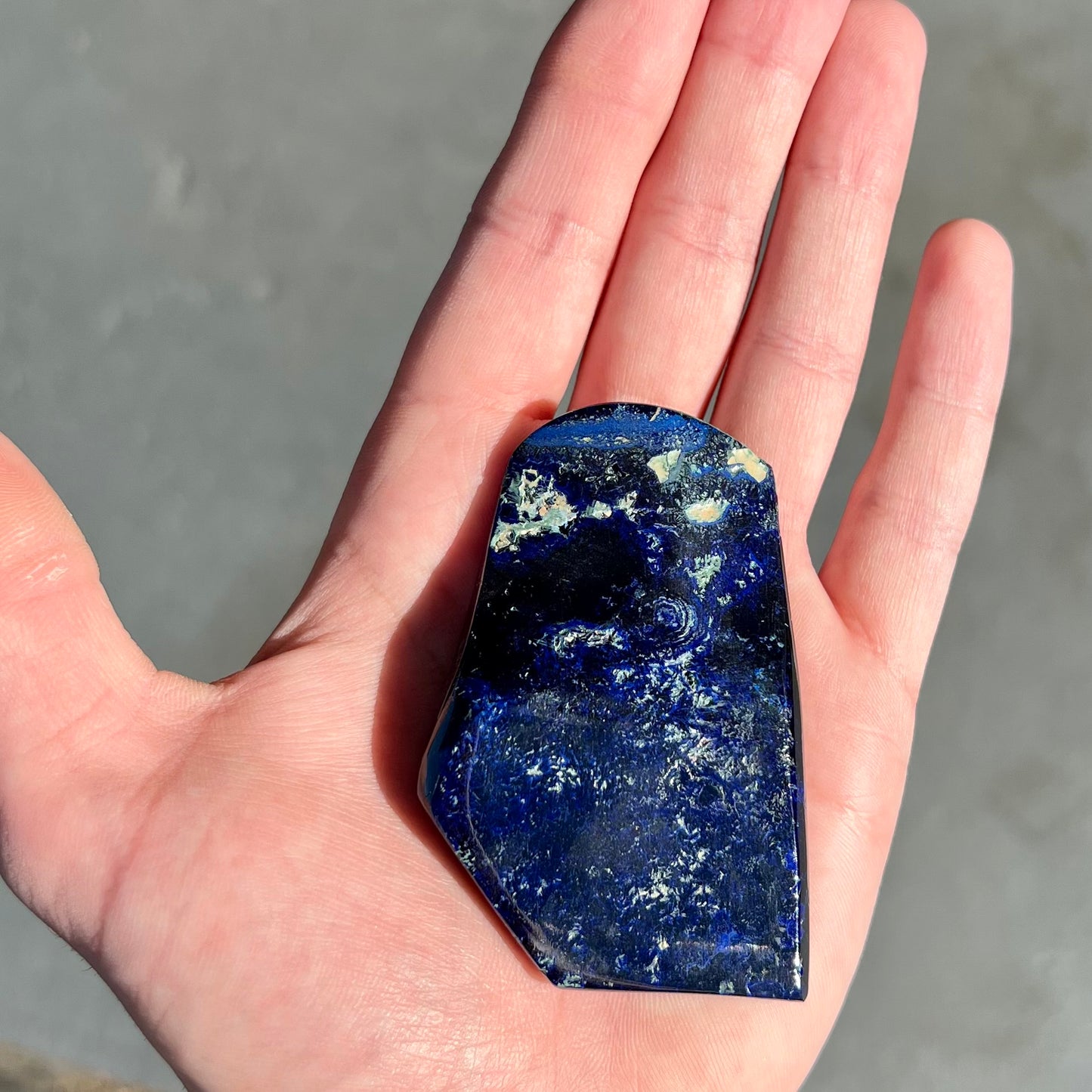 A polished piece of deep royal blue azurite.