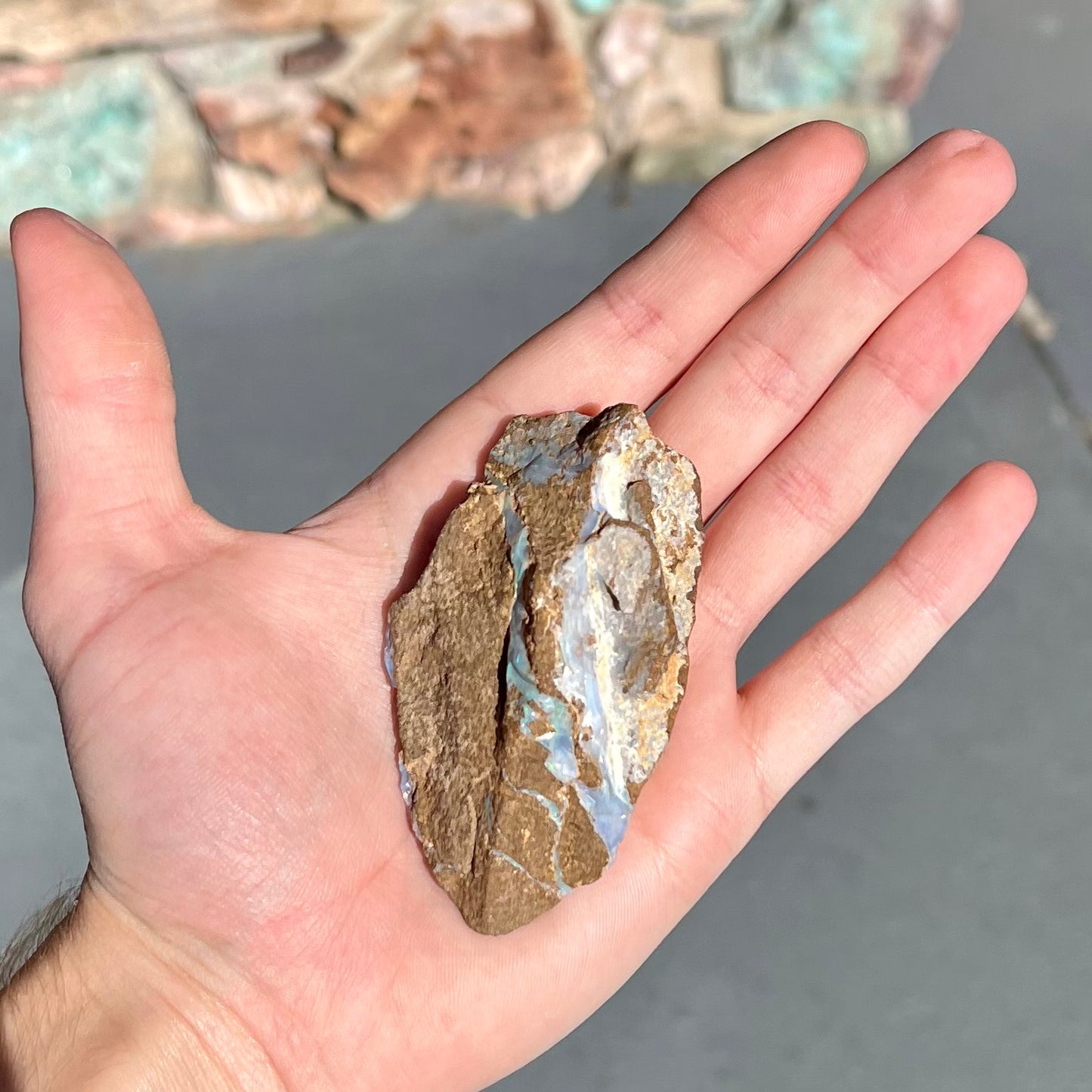 A rough boulder opal stone from Queensland, Australia.