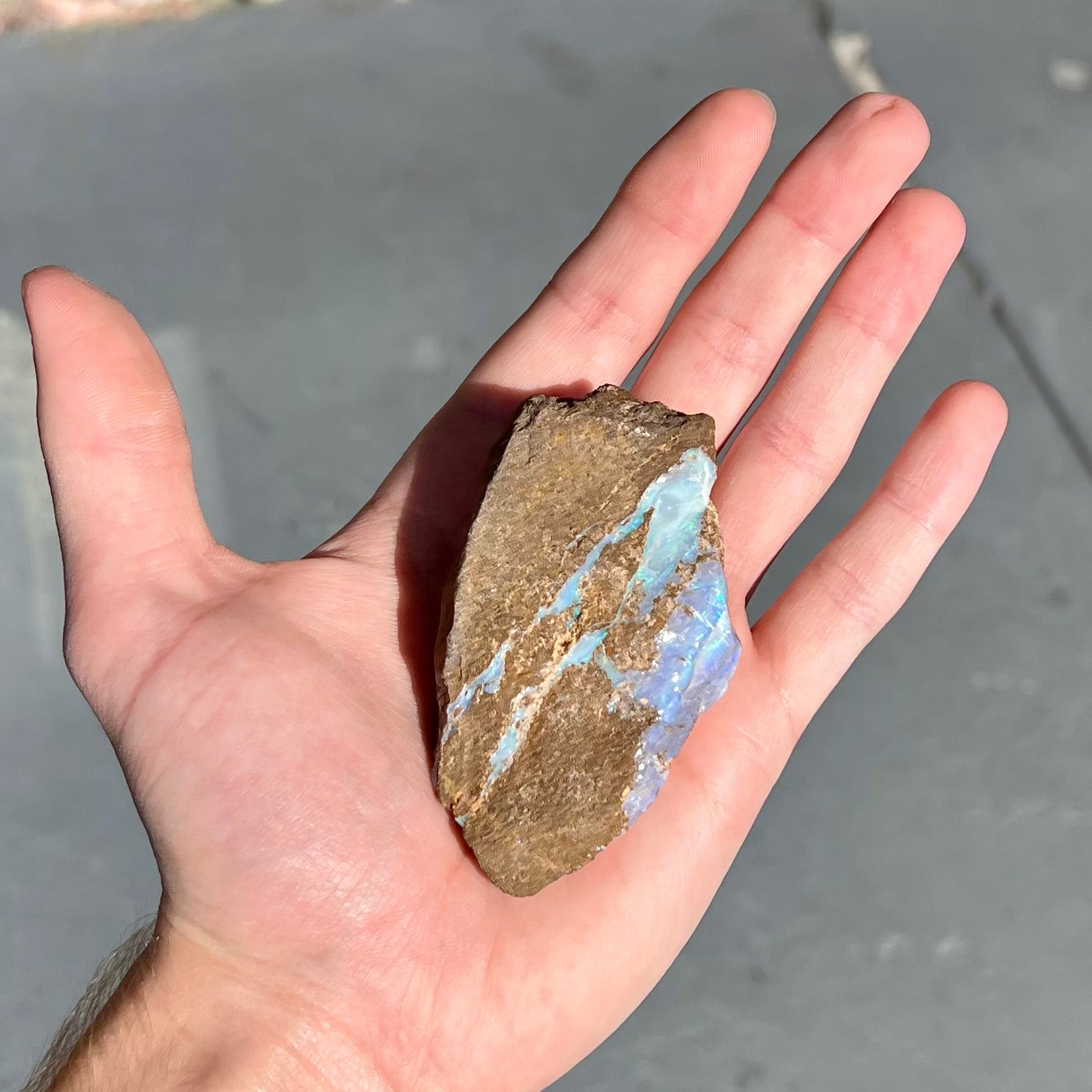 A rough boulder opal stone from Queensland, Australia.