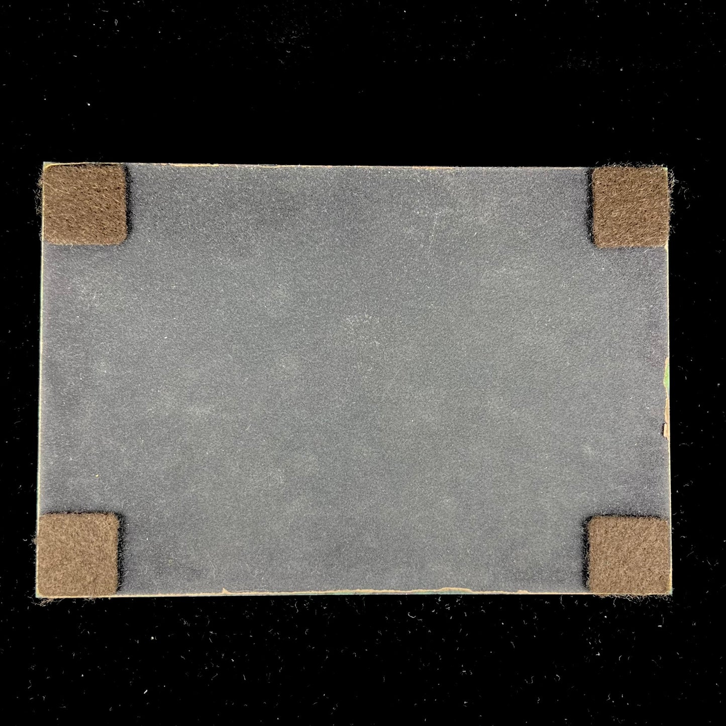 A stone box carved from Ruby in Zoisite stone and lined with green felt.