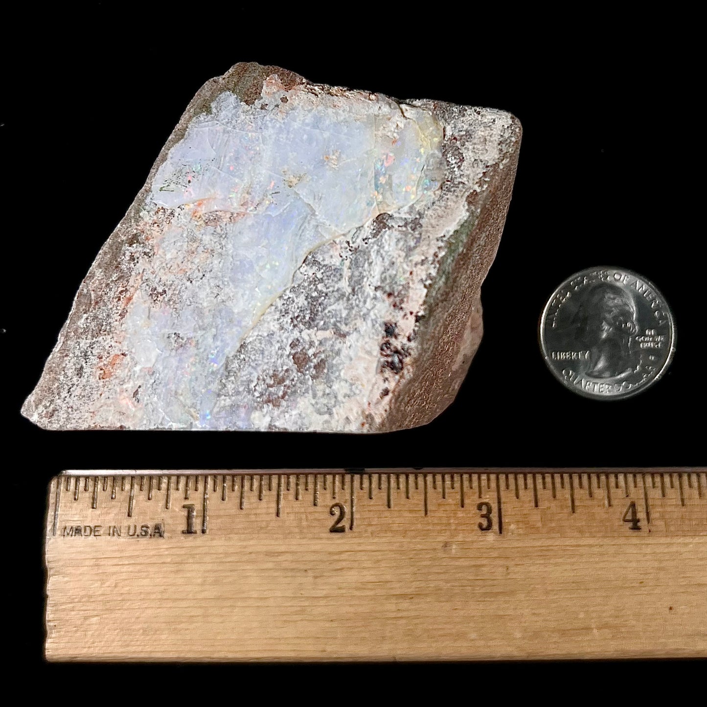 A lightly polished Painted Lady opal specimen from Andamooka, South Australia.