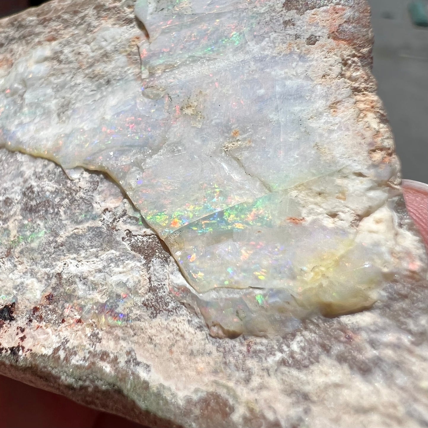 A lightly polished Painted Lady opal specimen from Andamooka, South Australia.