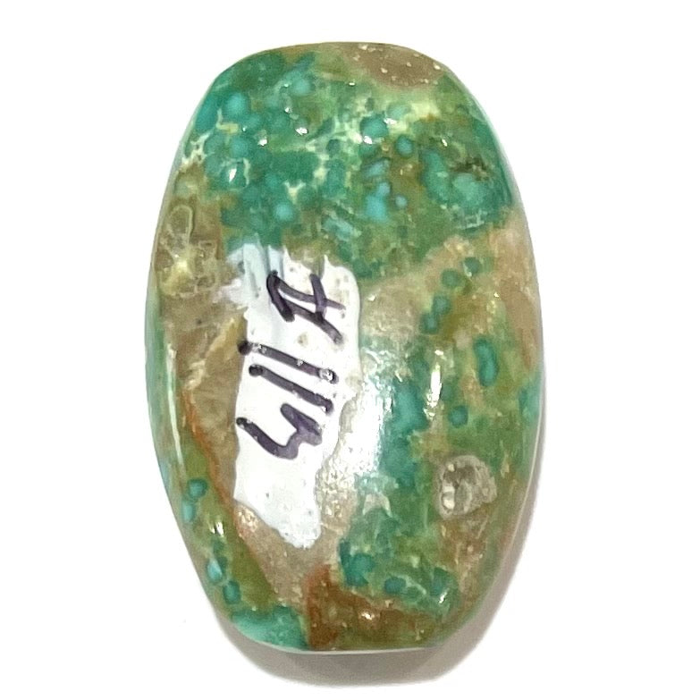A green splotched turquoise barrel cabochon from Royston Mining District, Nevada.