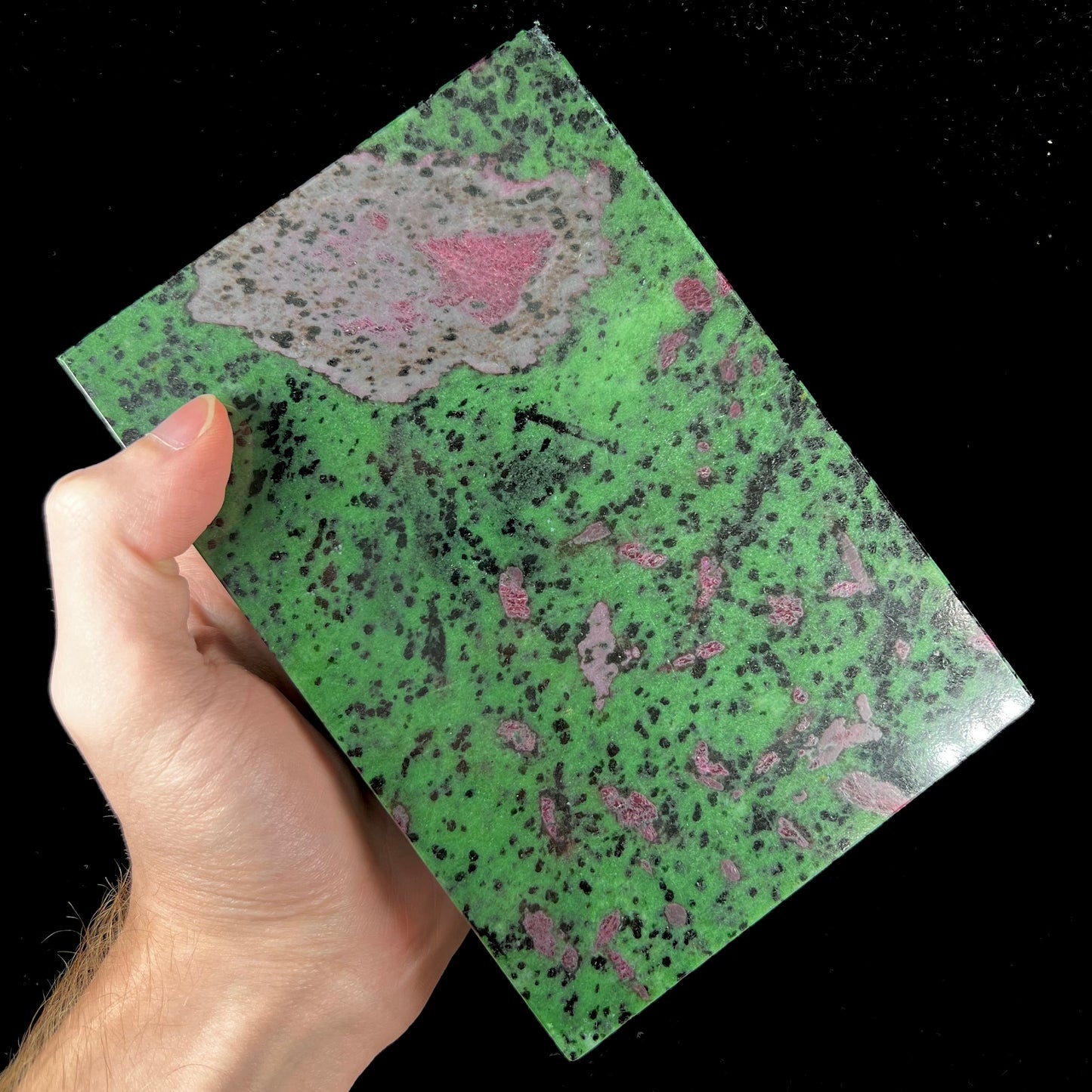 A stone box carved from Ruby in Zoisite stone and lined with green felt.