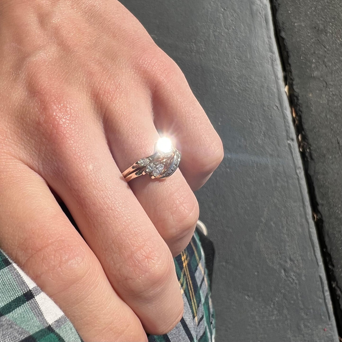 A ladies' diamond wedding set that has been soldered together in yellow gold. There are round and marquise cut diamonds.