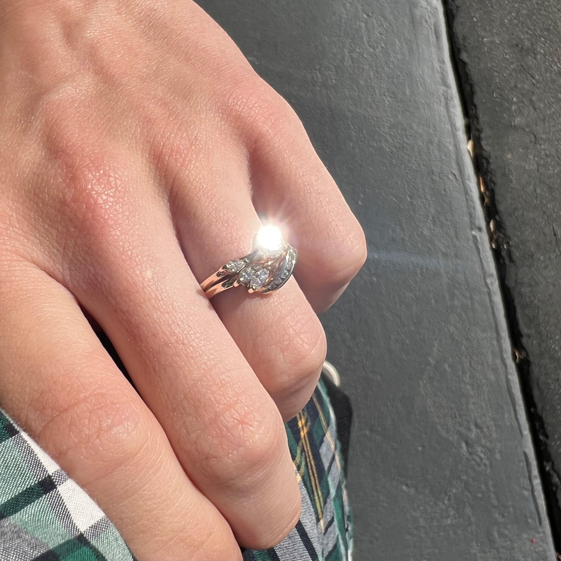 A ladies' diamond wedding set that has been soldered together in yellow gold.  There are round and marquise cut diamonds.