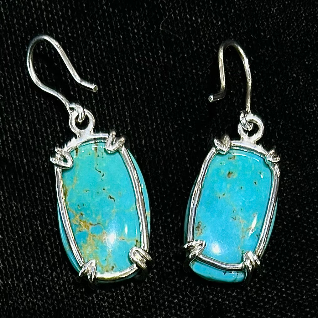 Sterling silver French wire earrings double prong set with cabochon cut Turquoise from Pilot Mountain Mine.