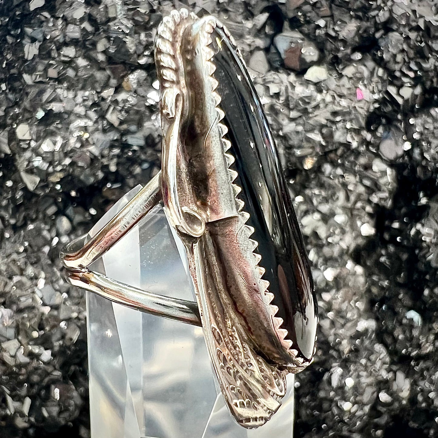 A sterling silver Navajo style onyx ring.
