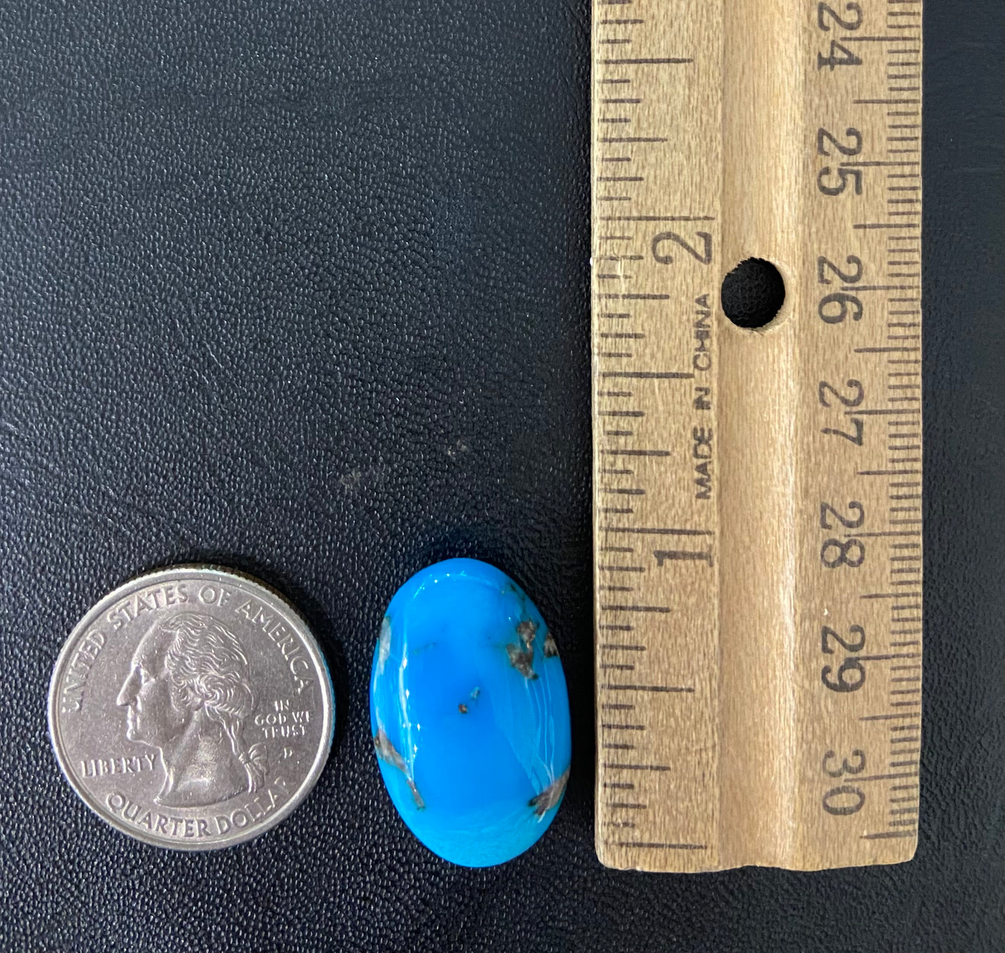 A bright blue Sleeping Beauty turquoise cabochon.