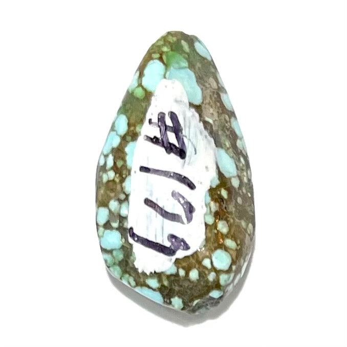 A loose, drop shaped turquoise stone from Number 8 Mine, Nevada.