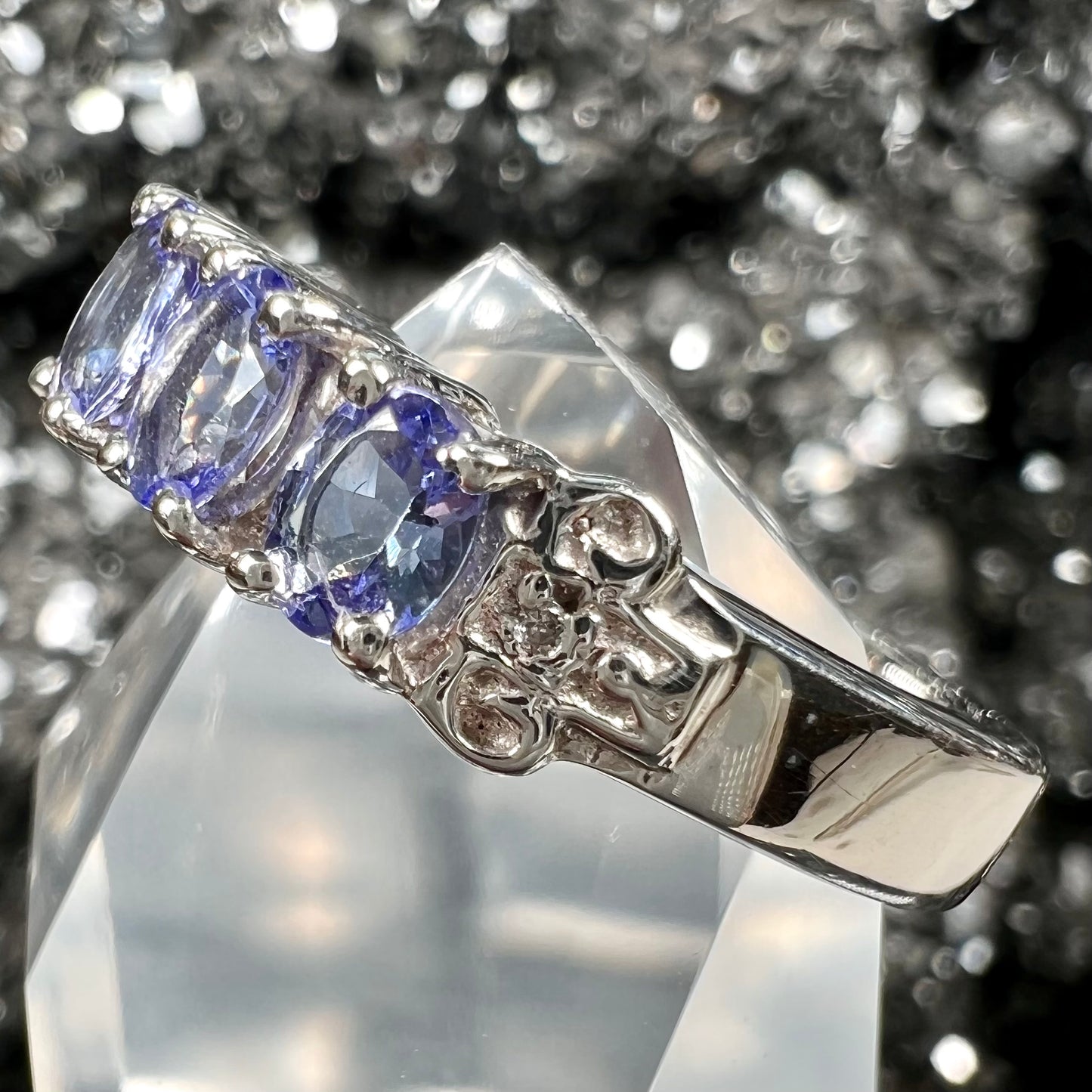 A sterling silver five stone oval cut tanzanite ring.