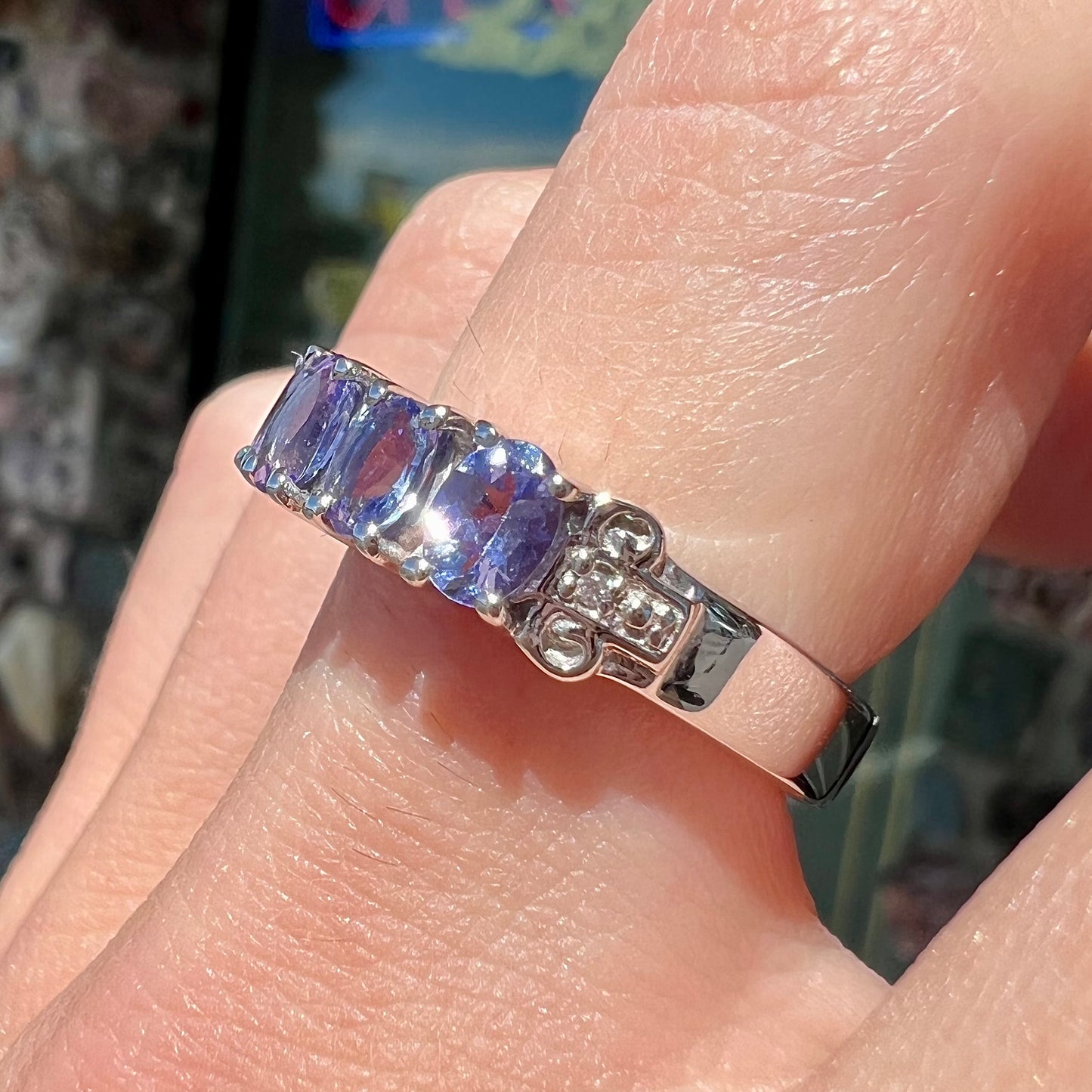 A sterling silver five stone oval cut tanzanite ring.