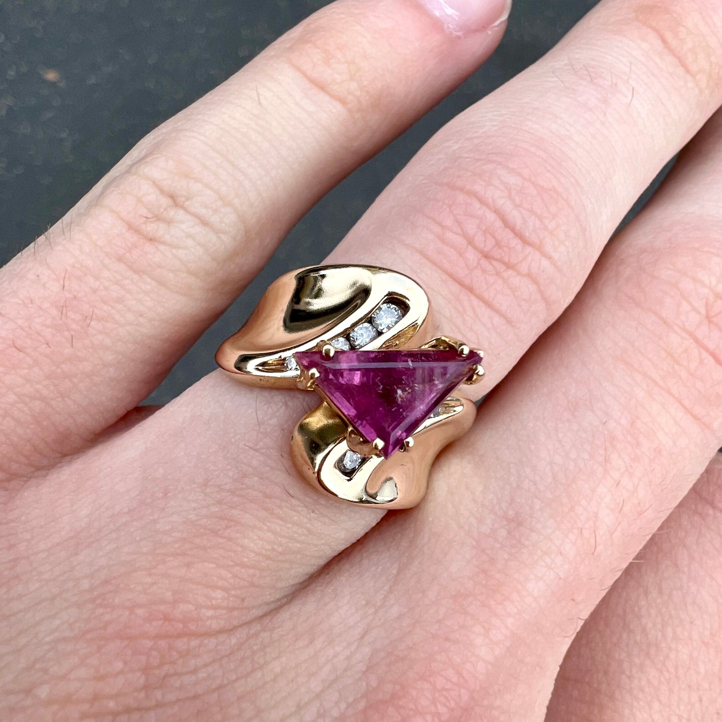 An estate yellow gold and diamond triangle cut Pala pink tourmaline ladies' ring.