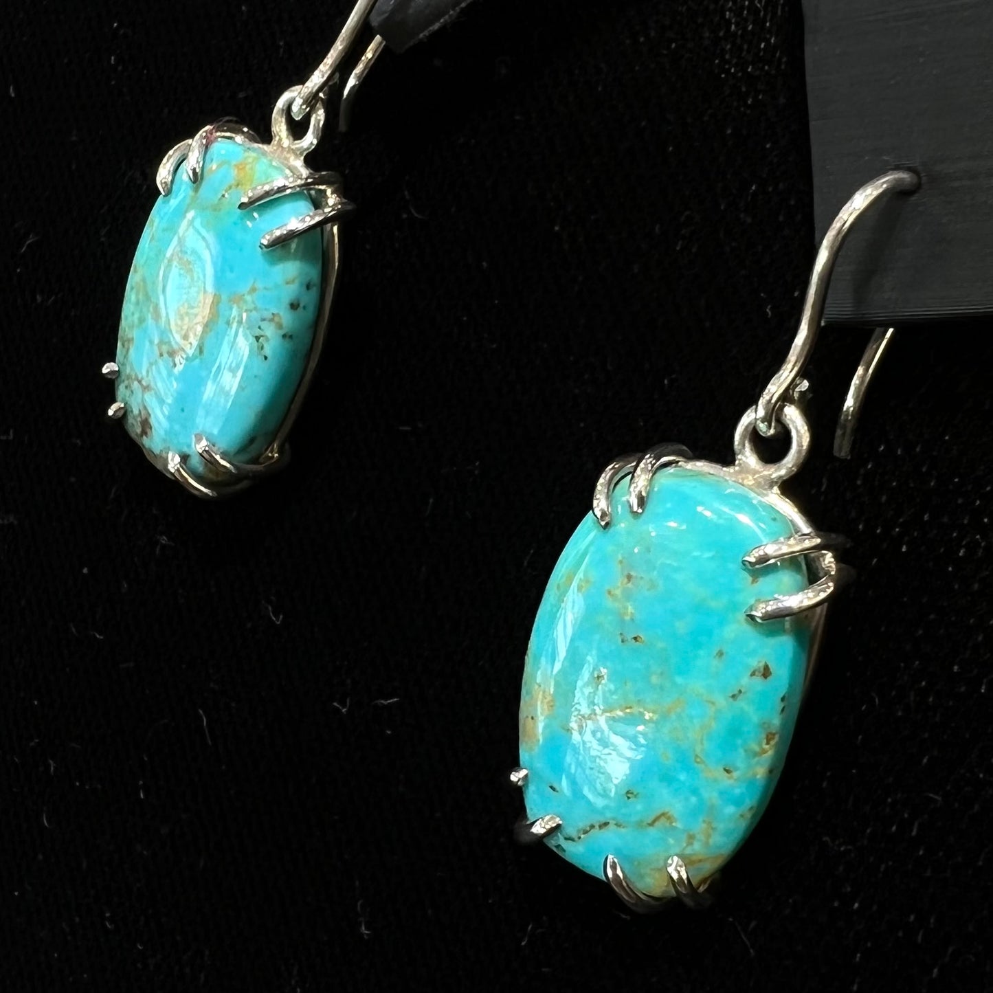 Sterling silver French wire earrings double prong set with cabochon cut Turquoise from Pilot Mountain Mine.