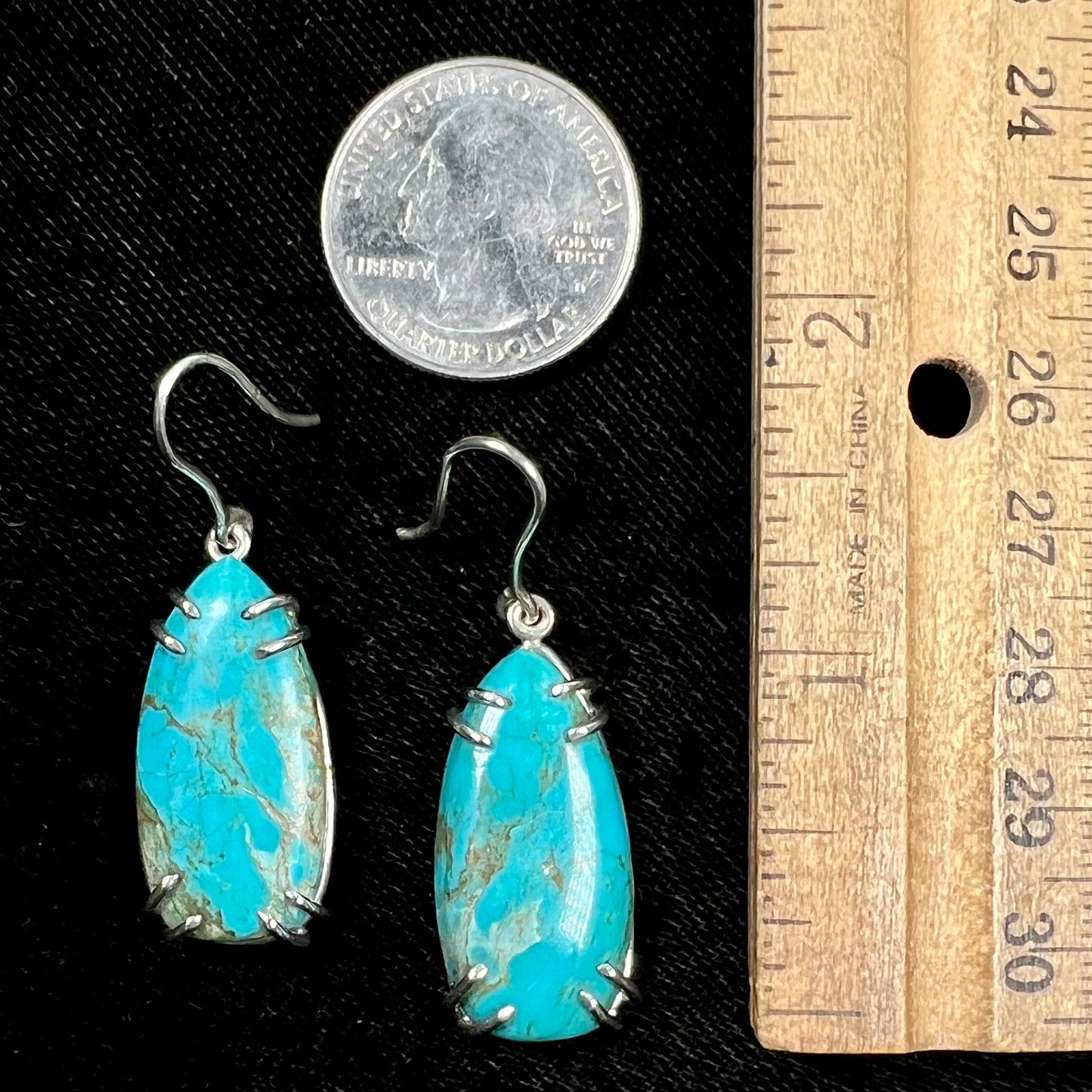 Sterling silver French wire earrings double prong set with cabochon cut turquoise from Pilot Mountain Mine.