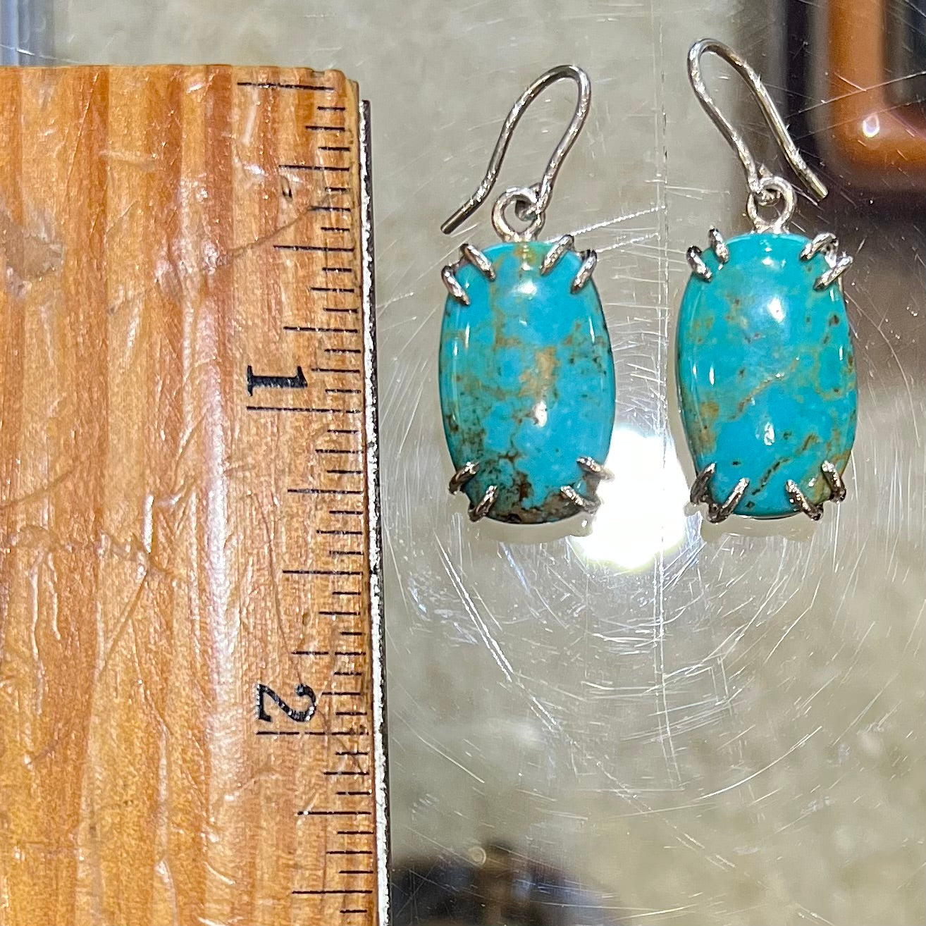 Sterling silver French wire earrings double prong set with cabochon cut Turquoise from Pilot Mountain Mine.