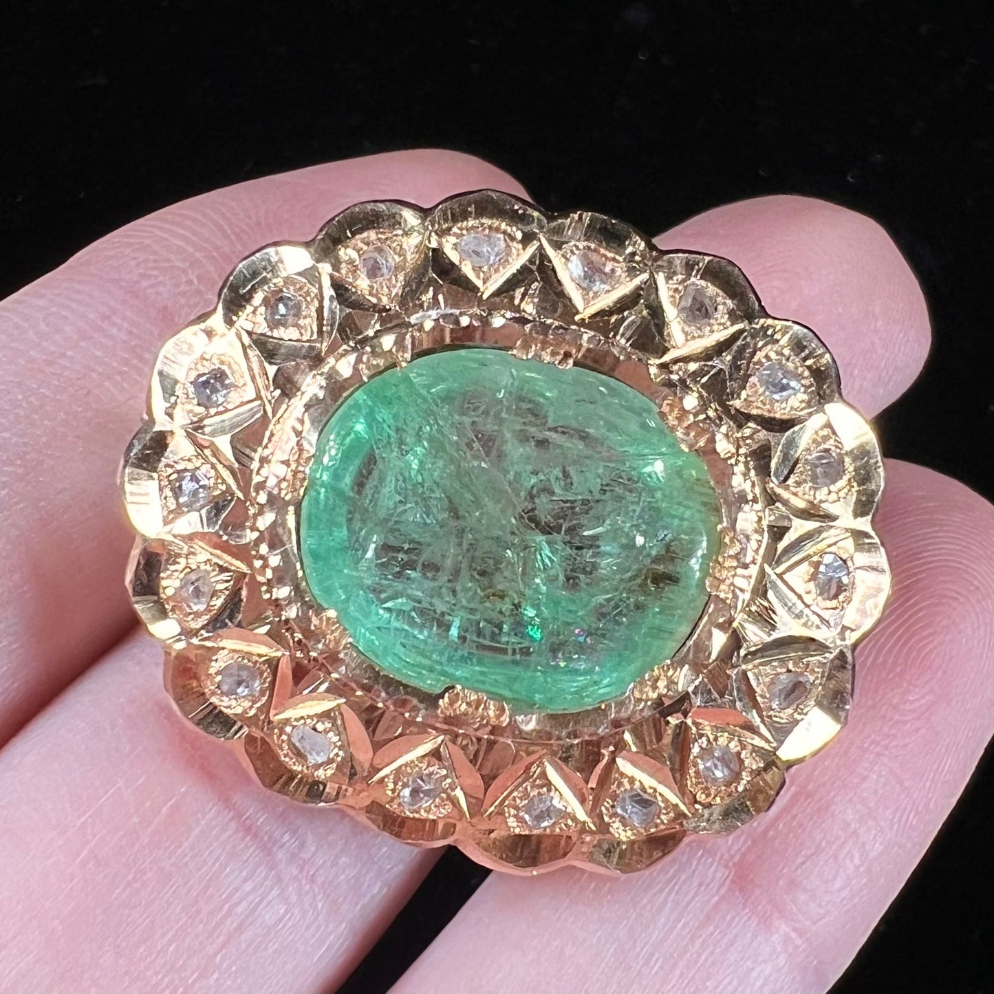 An antique 1800's Victorian emerald and diamond crystal brooch made in 18kt yellow gold.