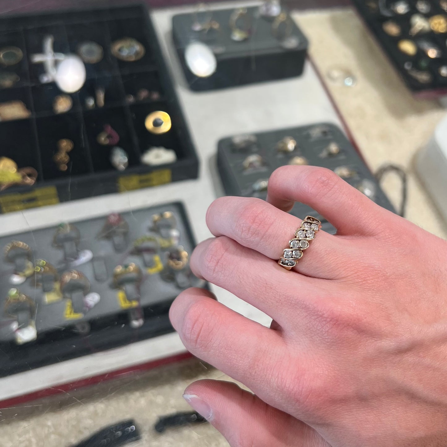 A ladies' estate yellow gold band set with 1 total carat of round brilliant cut diamonds.