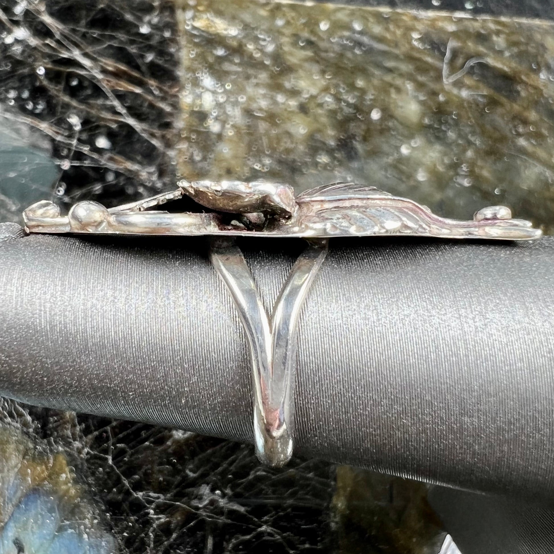 A sterling silver Navajo flower ring.