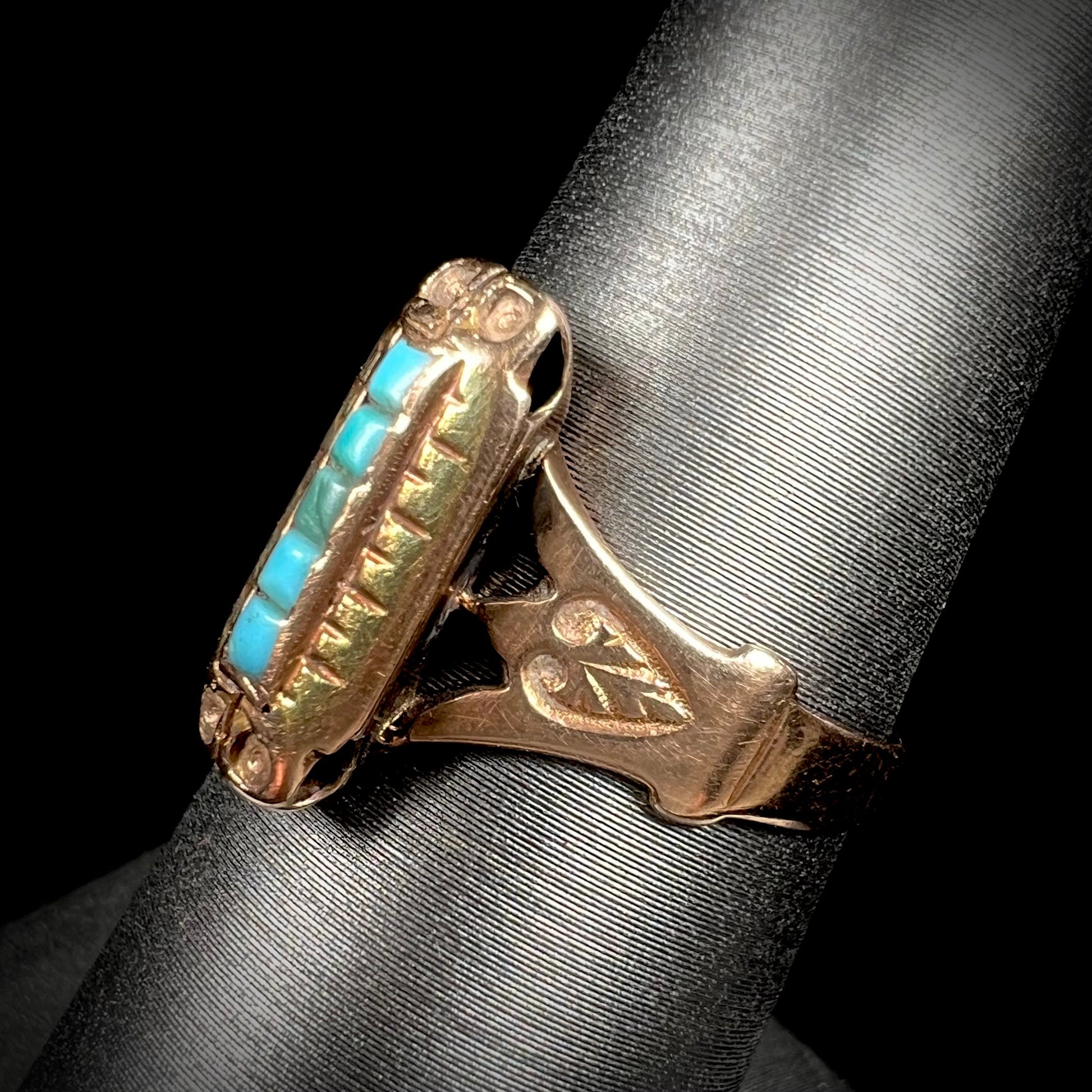 Antique yellow gold ring set with five square turquoise stones, circa 1920's.